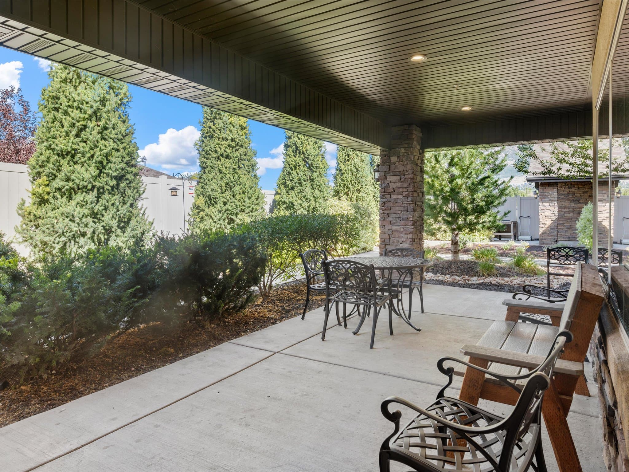 Covered patio seating in the memory care courtyard