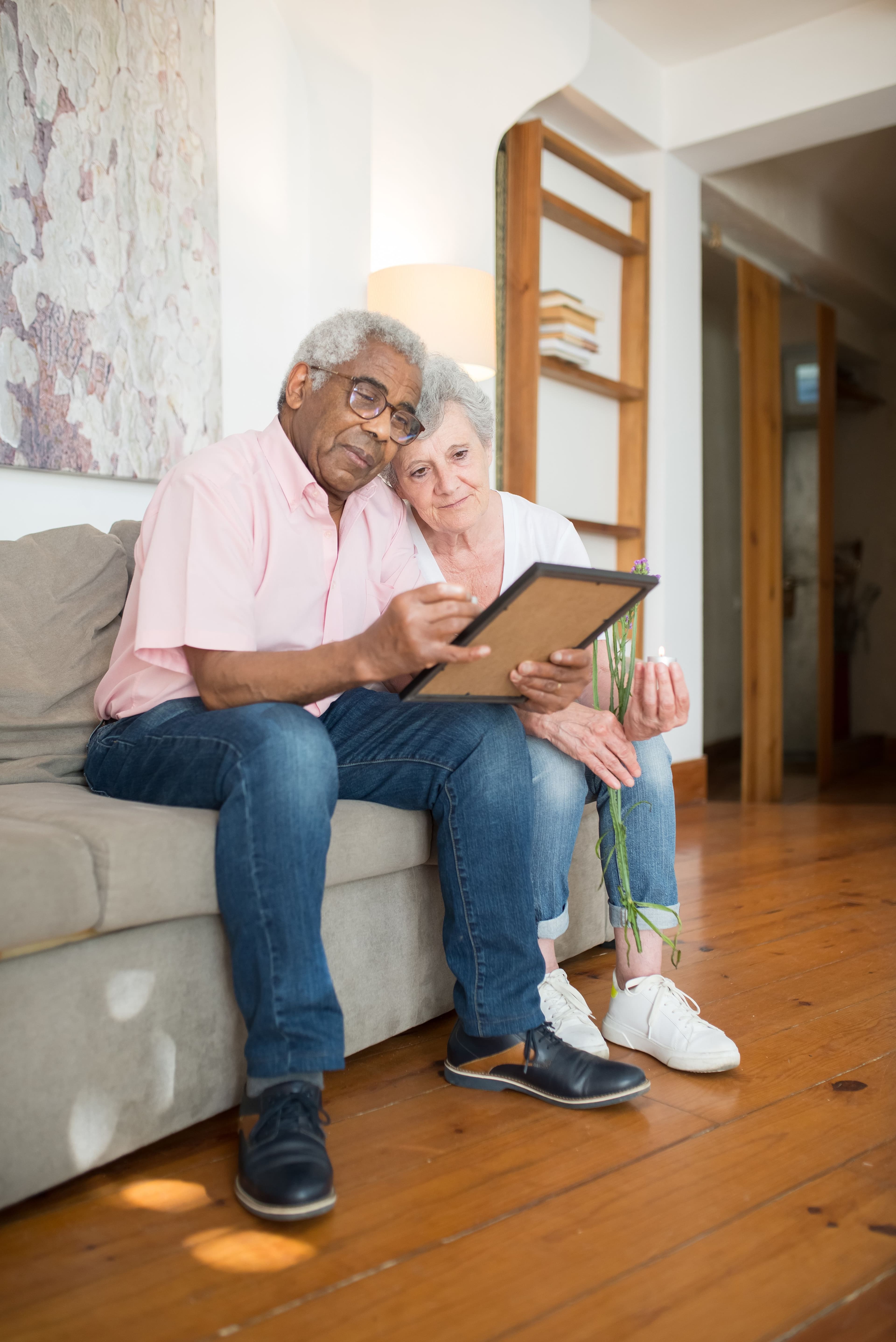Couple looking through photographs together