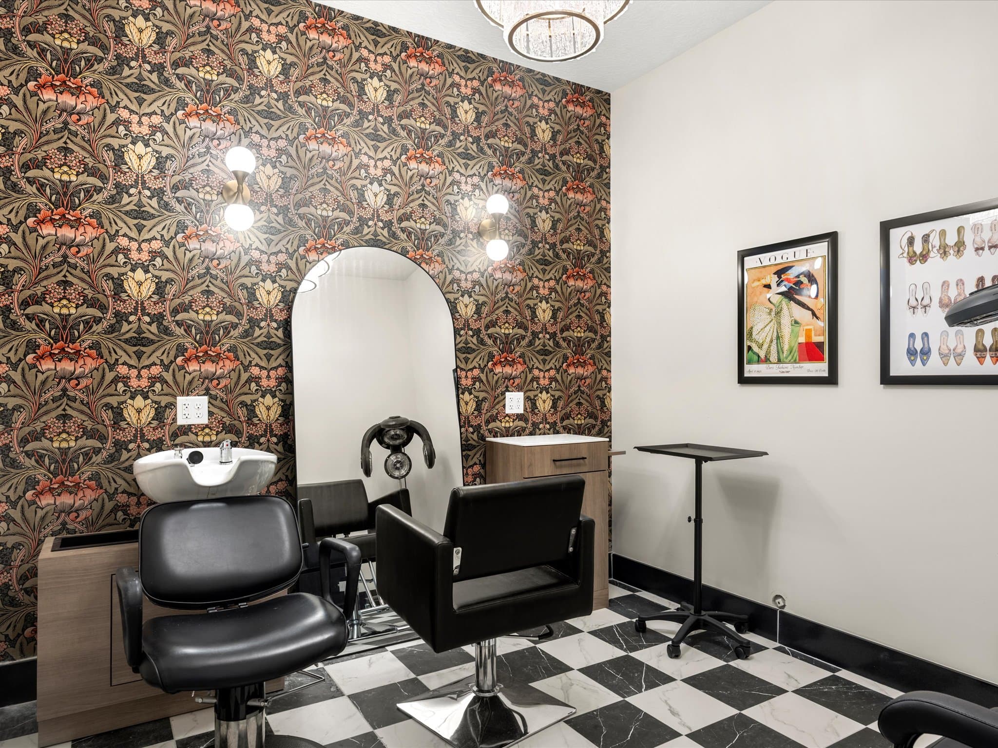 On-site salon with styling chairs and a shampoo station